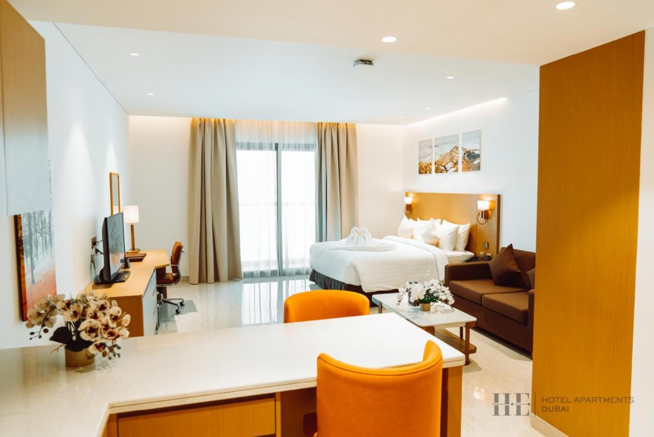 He Hotel Apartments Dubai Bagian luar foto Deluxe Suite